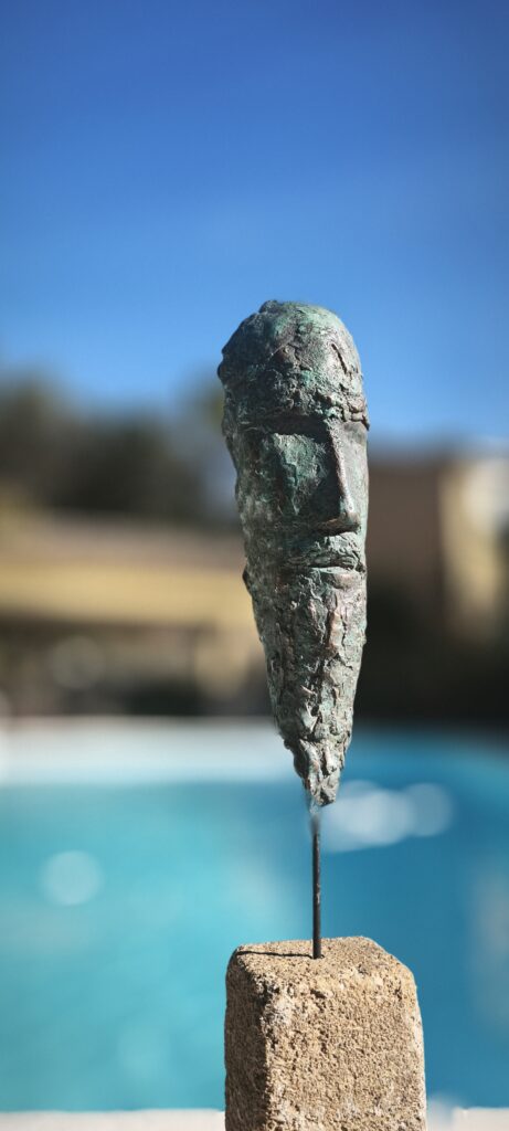 Sculpture en bronze visage fin d'homme sage